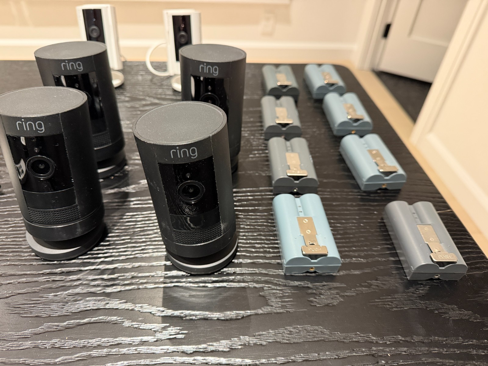 6 Ring Cameras and 8 Batteries