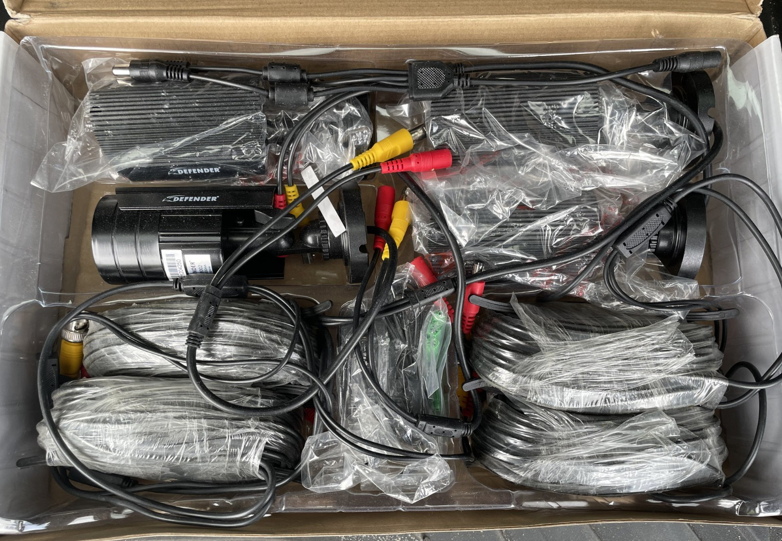 Lot of (4) Defender #21002 Outdoor Security Cameras w/ Wiring – BRAND NEW